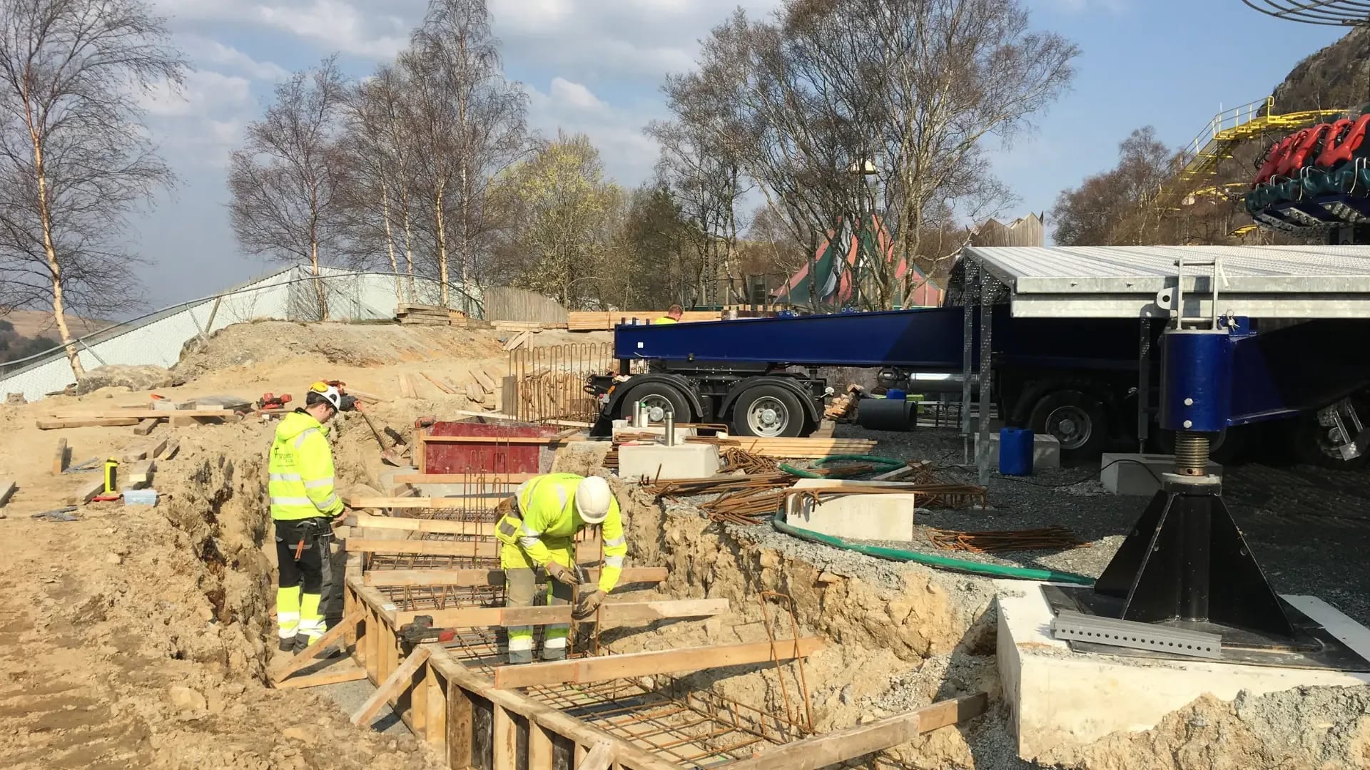 Tying reinforcement in the stepped footings beneath the ride.